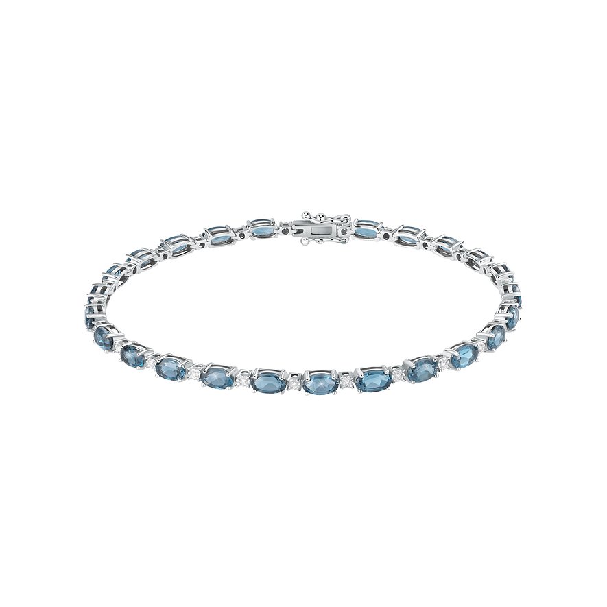 CHRIST 750 Weißgold Armband im Tennis-Stil, besetzt mit ovalen blauen Topasen und kleinen runden klaren Steinen.