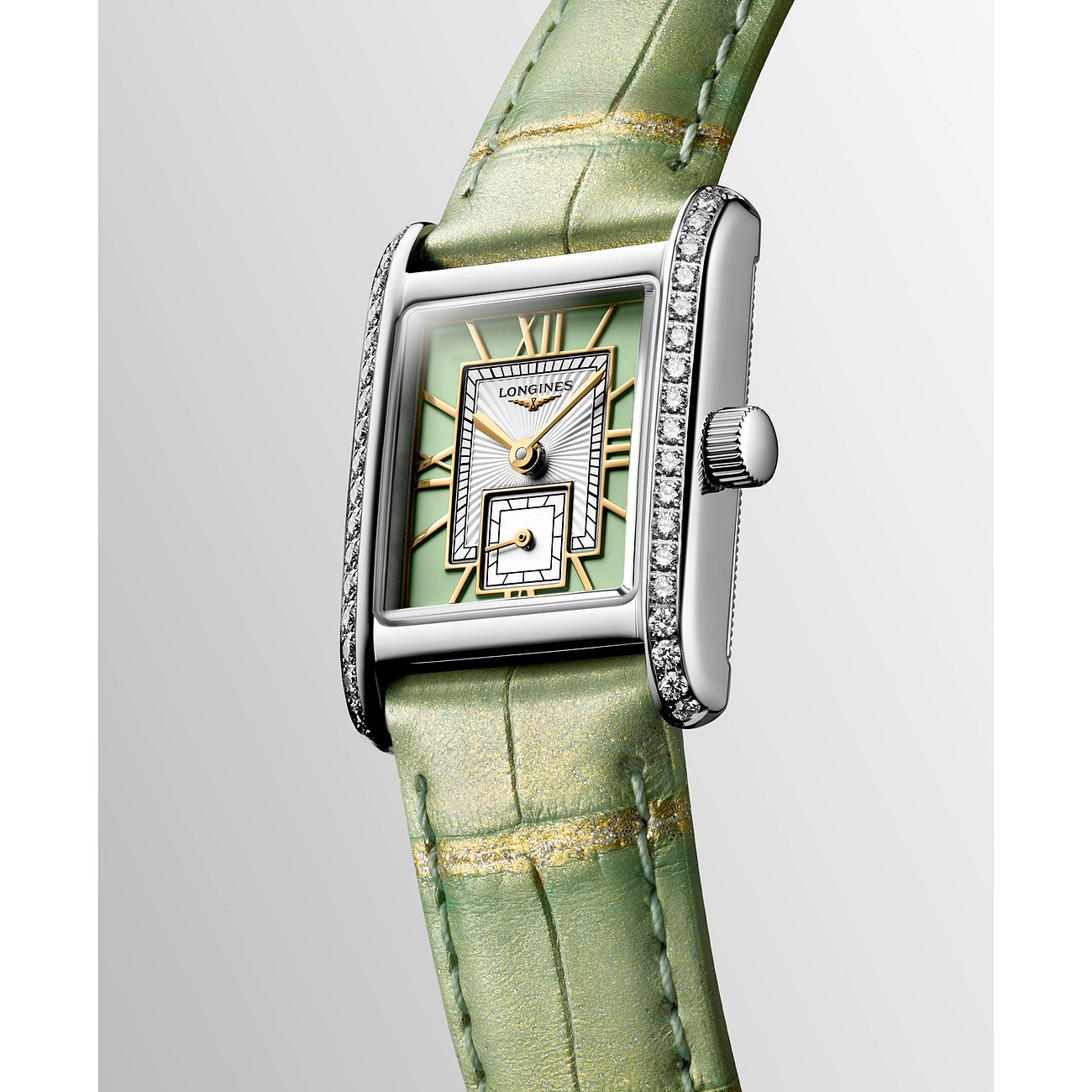 Longines Damenuhr mit Edelstahlgehäuse, besetzt mit Diamanten, hellgrünem Armband.