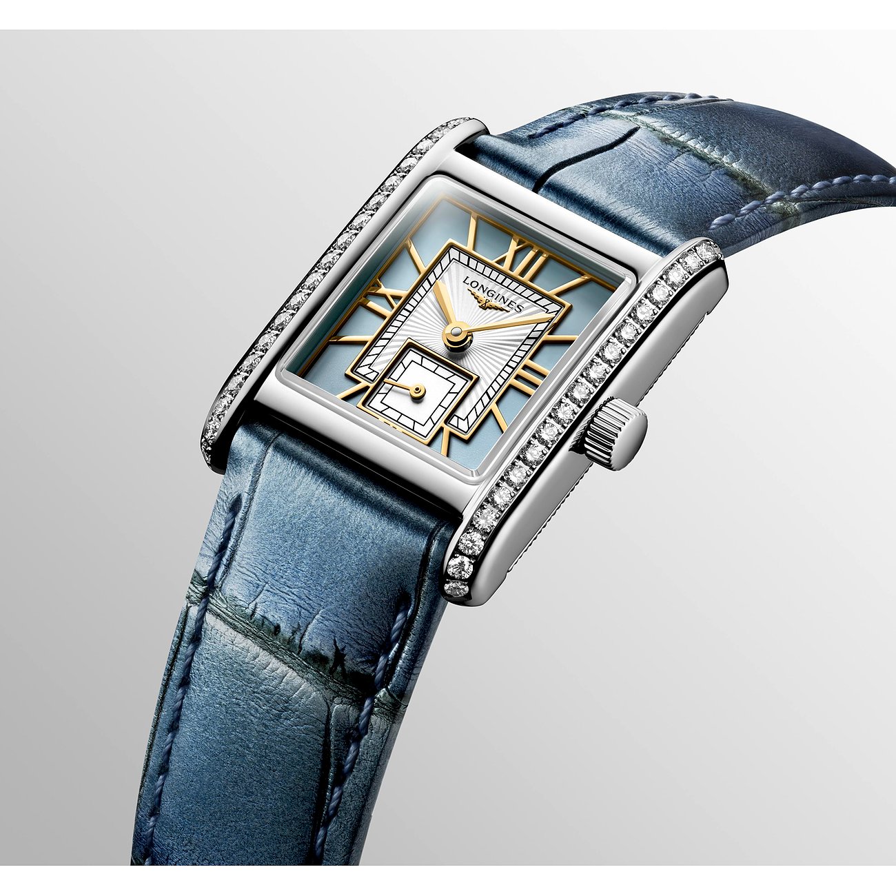 Longines Damenuhr aus Edelstahl mit Diamanten und blauem Armband.