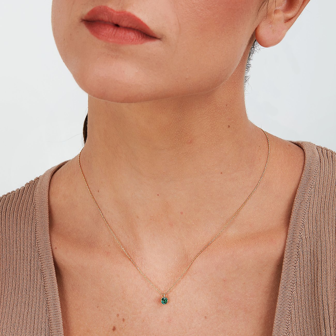 Live Diamond Halsschmuck aus 375 Gelbgold mit Smaragd.