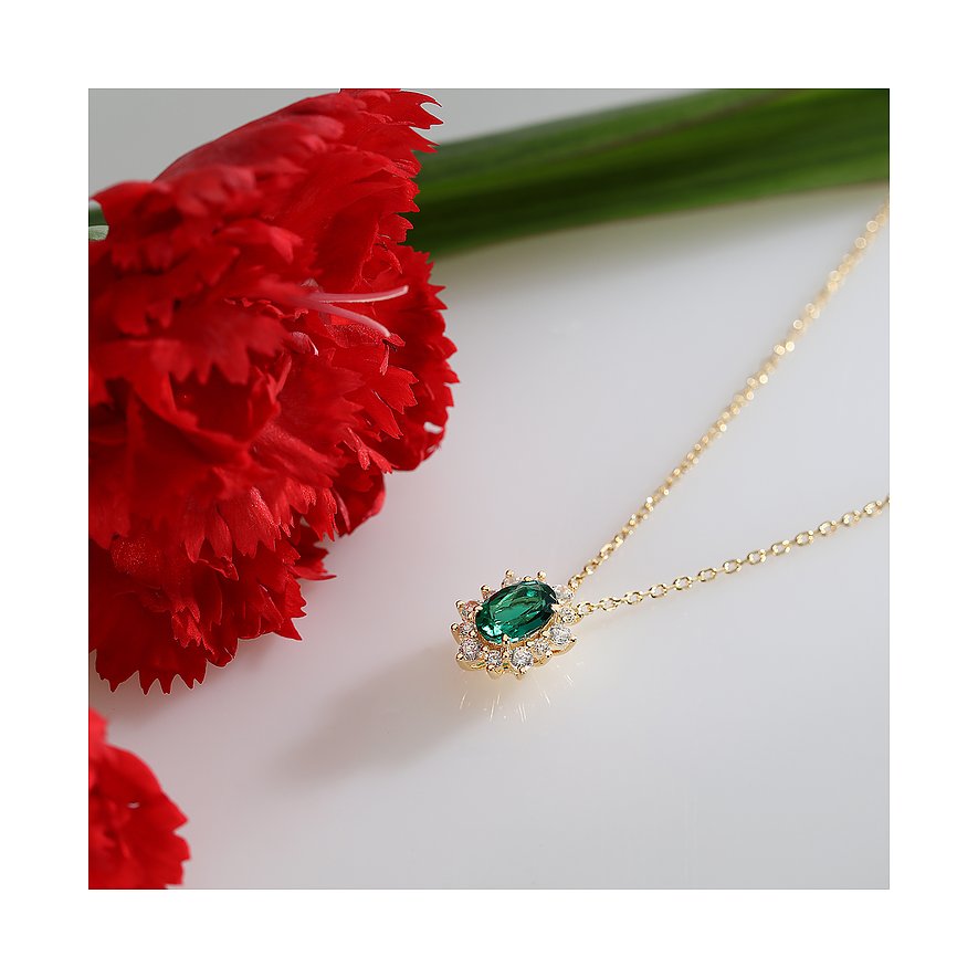 Live Diamond Halsschmuck aus 375 Gelbgold mit Smaragd und weißen Steinen.