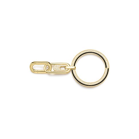 Ania Haie charm i forgyldt sølv med zirkonia, bestående af en kæde og en cirkel.