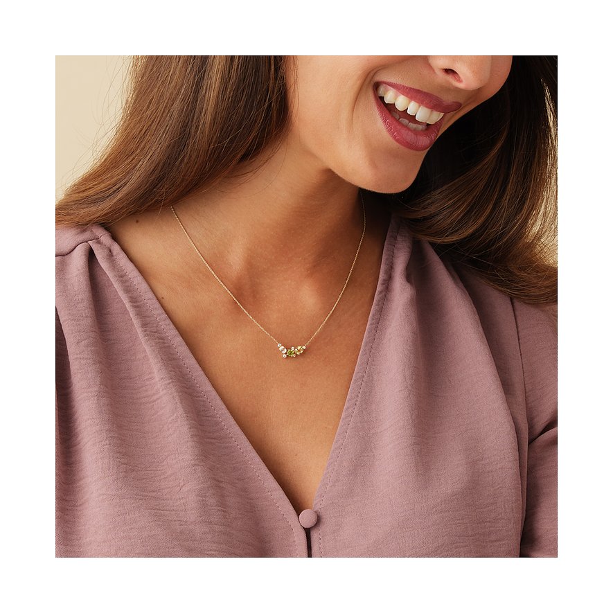 CHRIST Damesketting van 585 geelgoud met citroenkwarts en witte stenen.