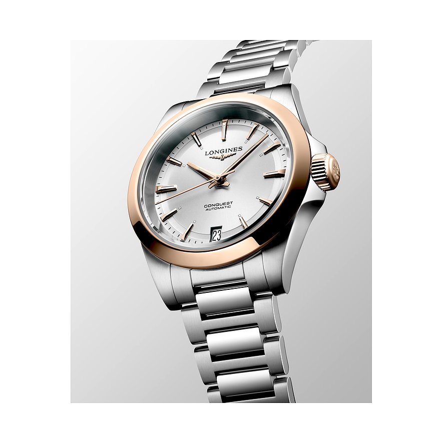 Longines Damenuhr mit Edelstahlgehäuse, Roségold-Lünette und silbernem Zifferblatt.