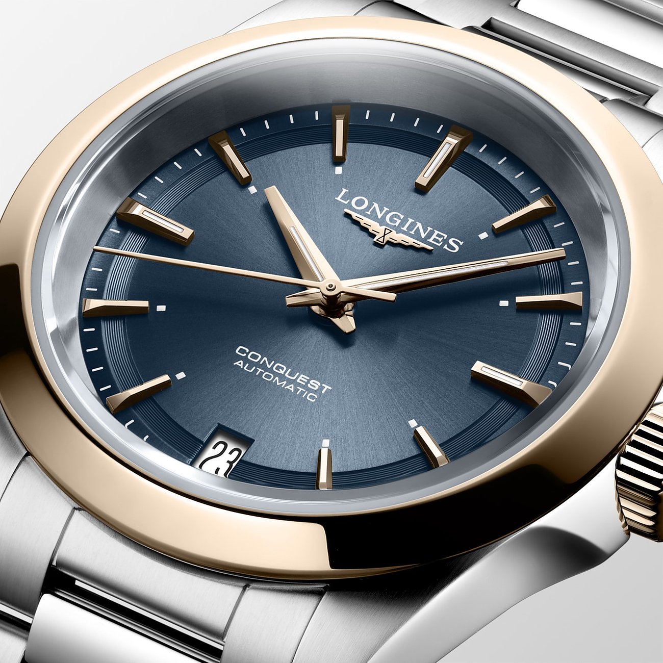 Longines Damenuhr aus Edelstahl und 750 Roségold, analog mit blauem Zifferblatt.