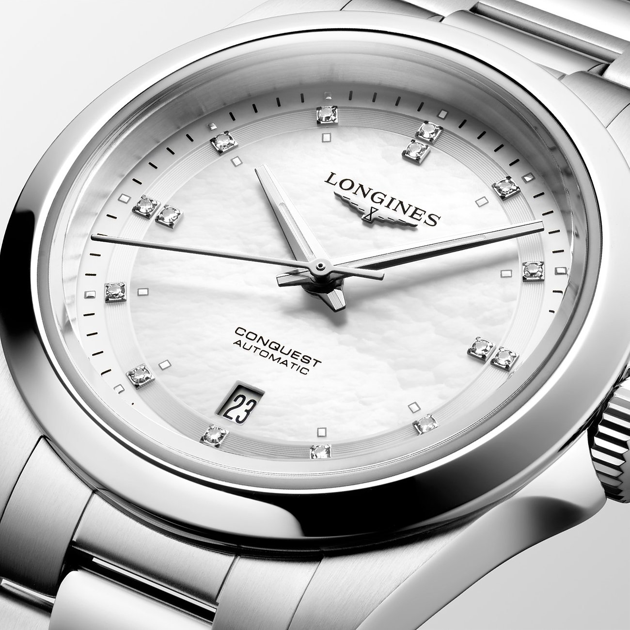 Longines Damenuhr aus Edelstahl mit Diamanten, analog, Datum.