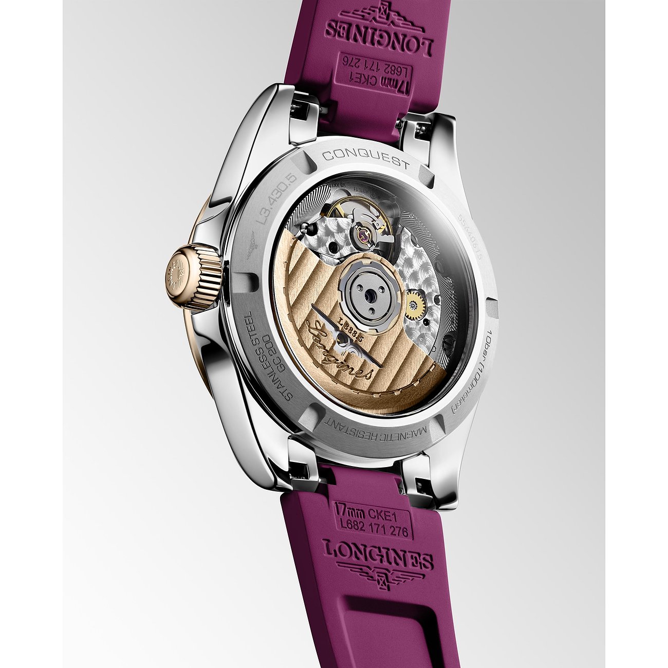 Longines Conquest Damenuhr mit Edelstahlgehäuse und Roségold-Elementen, lila Band.