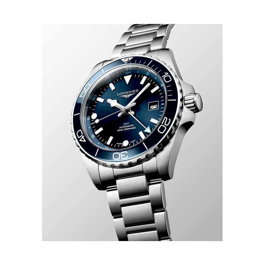 Longines Herrenuhr mit Edelstahlgehäuse, blauem Zifferblatt und Keramiklünette.