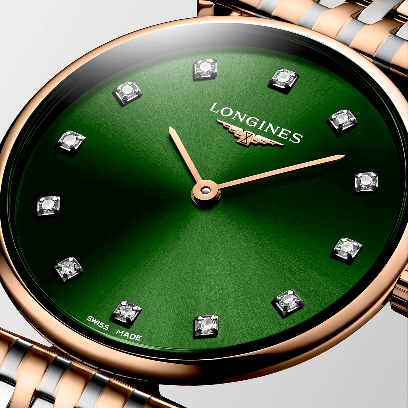Longines Damenuhr mit Edelstahlgehäuse, grünem Zifferblatt und Diamanten.
