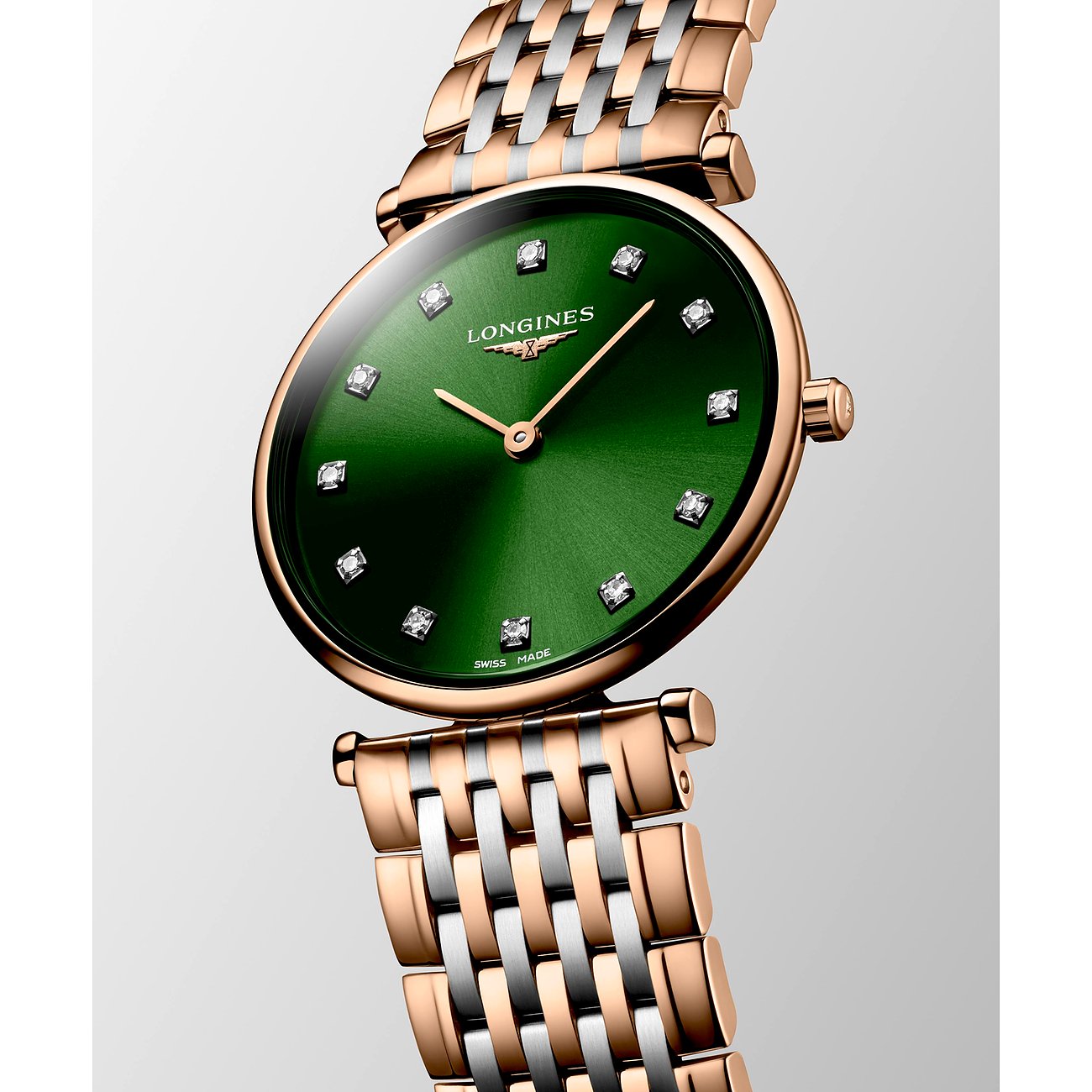 Longines Damenuhr aus bicolor Edelstahl mit grünen Zifferblatt und Diamanten.