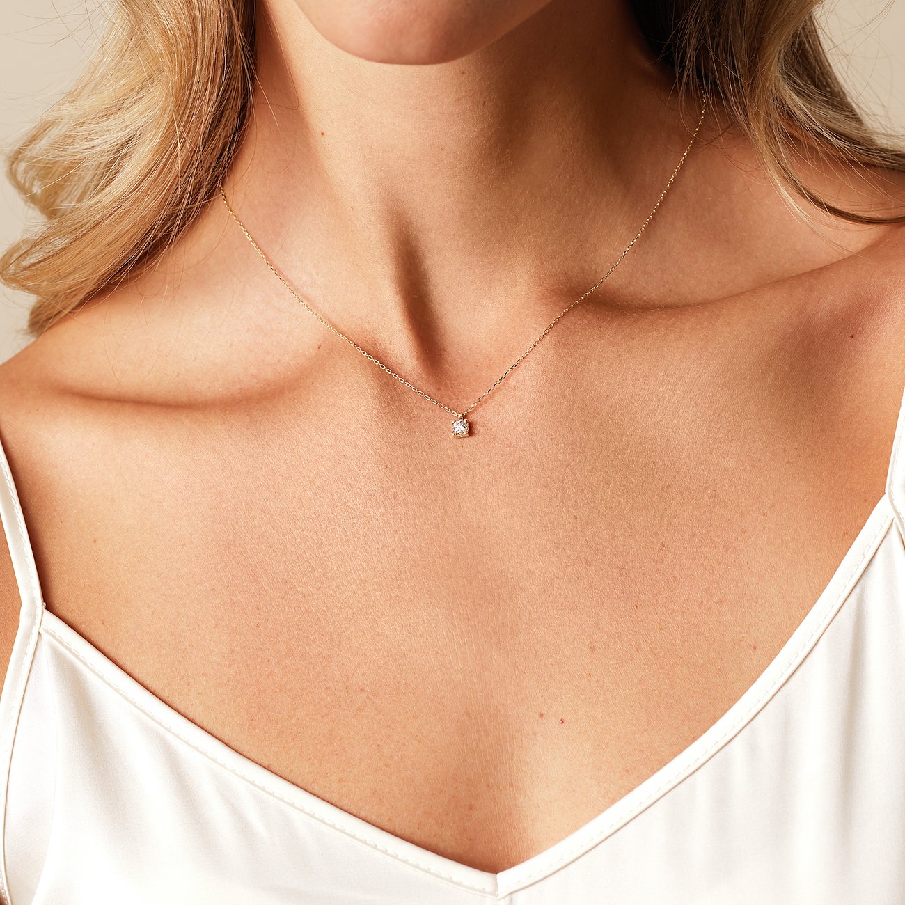 CHRIST Damesketting van 585 geelgoud met diamant.