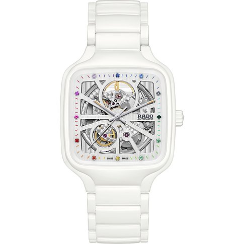 Rado Unisexuhr aus weißer Keramik mit skelettiertem Zifferblatt und farbigen Indexsteinen.