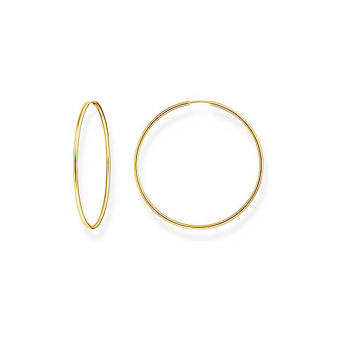 Thomas Sabo Ohrringe aus 925er Silber, goldfarben, als Creolen.