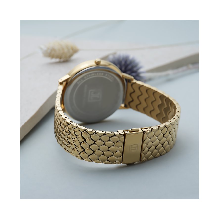 JETTE Damenuhr aus Edelstahl, goldfarben, mit Kristallen und Schuppenmuster.