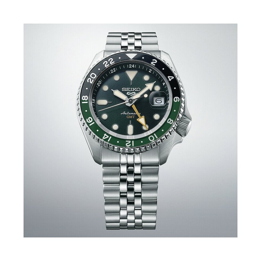 Seiko Herrenuhr mit Edelstahlgehäuse, dunkelgrünem Zifferblatt und bicolor Lünette.