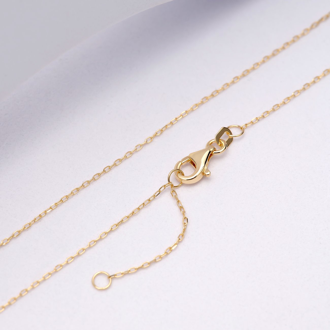 CHRIST Kette aus 585 Gelbgold mit Smaragd und Karabinerverschluss.