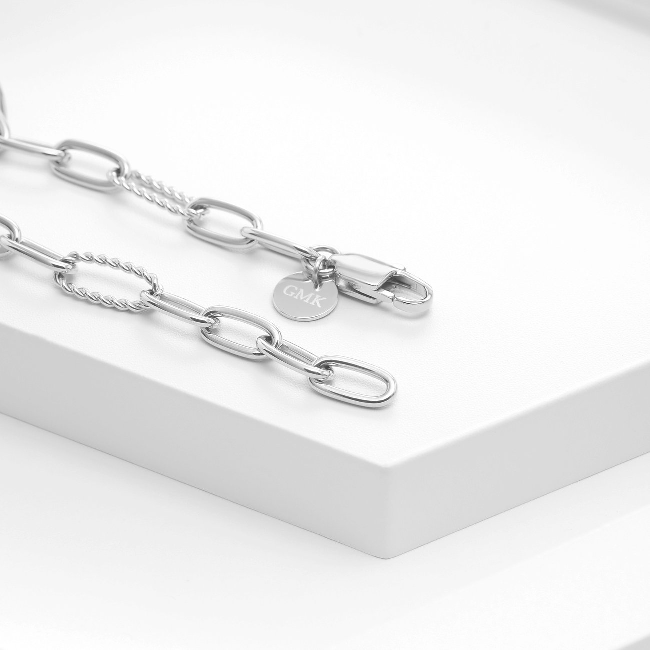 GMK Collection armband i rostfritt stål med ovala och tvinnade länkar.