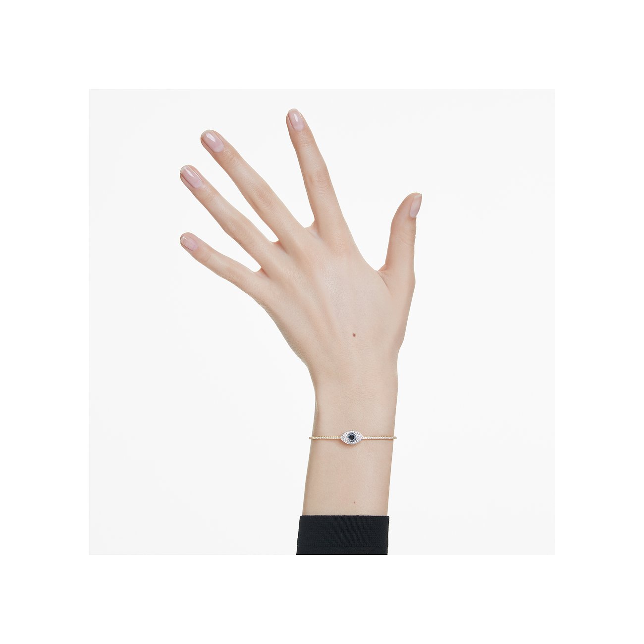 Swarovski armband van roségoudkleurig metaal met blauwe en witte kristallen.