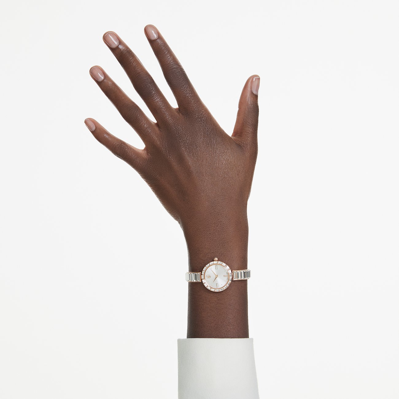 Swarovski Damenuhr mit rosévergoldetem Metallgehäuse und Kristallen.