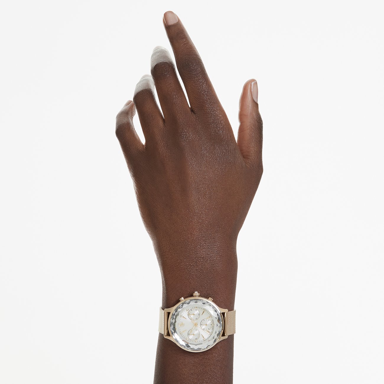 Swarovski Damenuhr mit roségoldfarbenem Gehäuse und Kristallbesatz, analog.