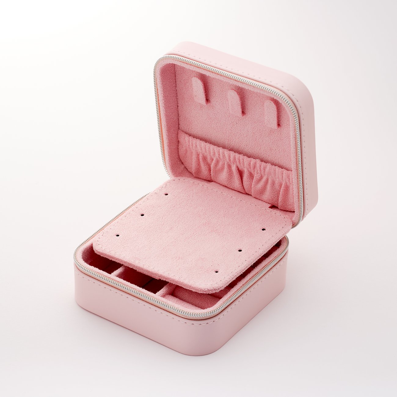 CHRIST Schmuckkästchen aus Lederimitation in Rosa mit Reißverschluss.