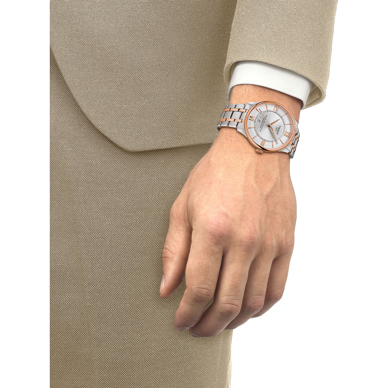 Tissot Herrenuhr mit Edelstahlgehäuse, bicolor, analog mit römischen Ziffern.