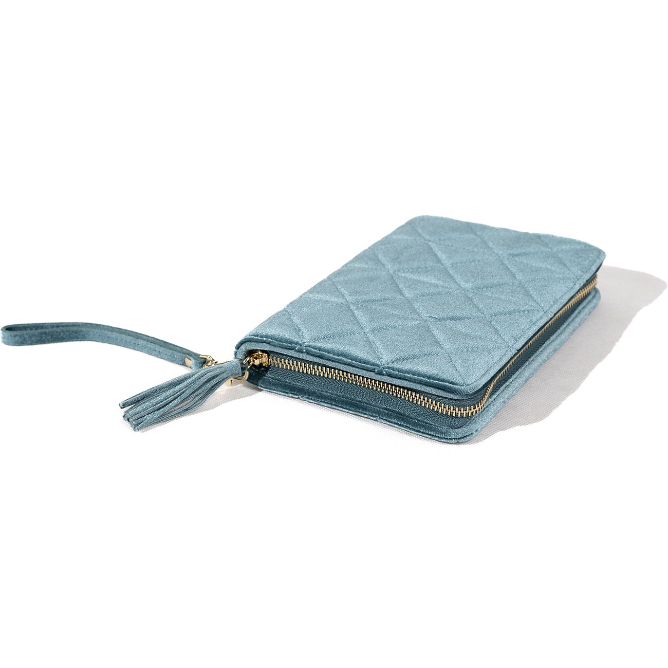 Friedrich23 Clutch aus blauem Samt mit gestepptem Design und Quaste.