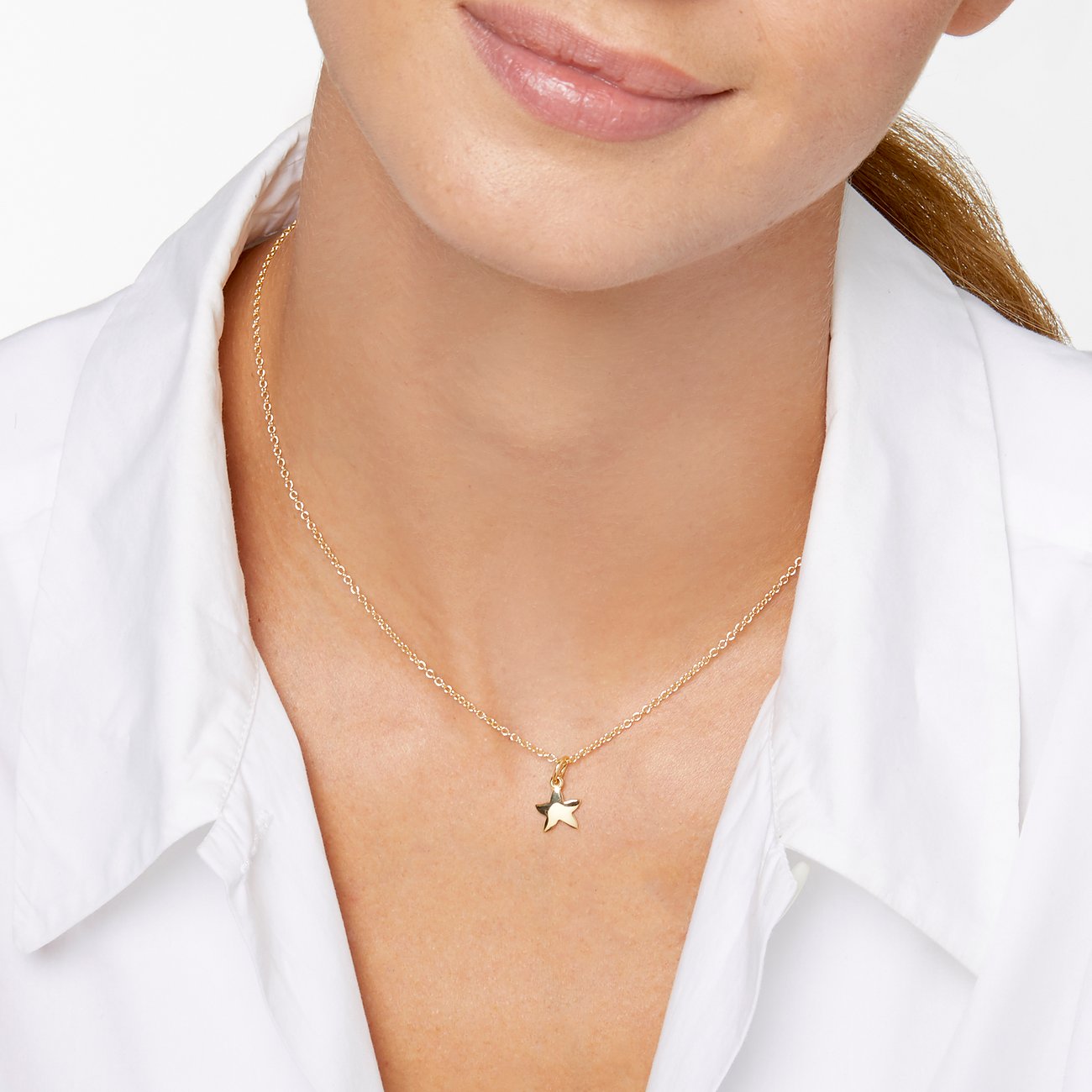 DoDo Anhänger aus 750 Gelbgold mit Stern.