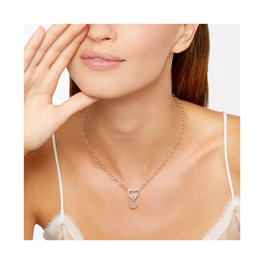 DoDo Anhängeschmuck aus 375 Roségold mit Herz-Anhänger und kleinen Steinen.