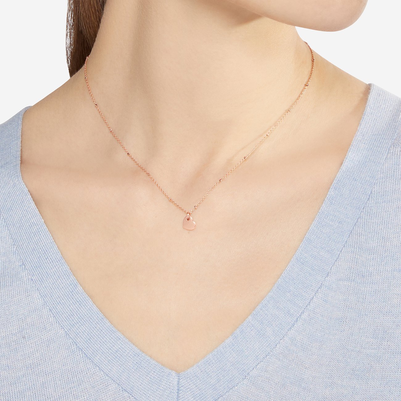DoDo halsketting van 375 roségoud met 375 witgoud, hartvormige hanger.
