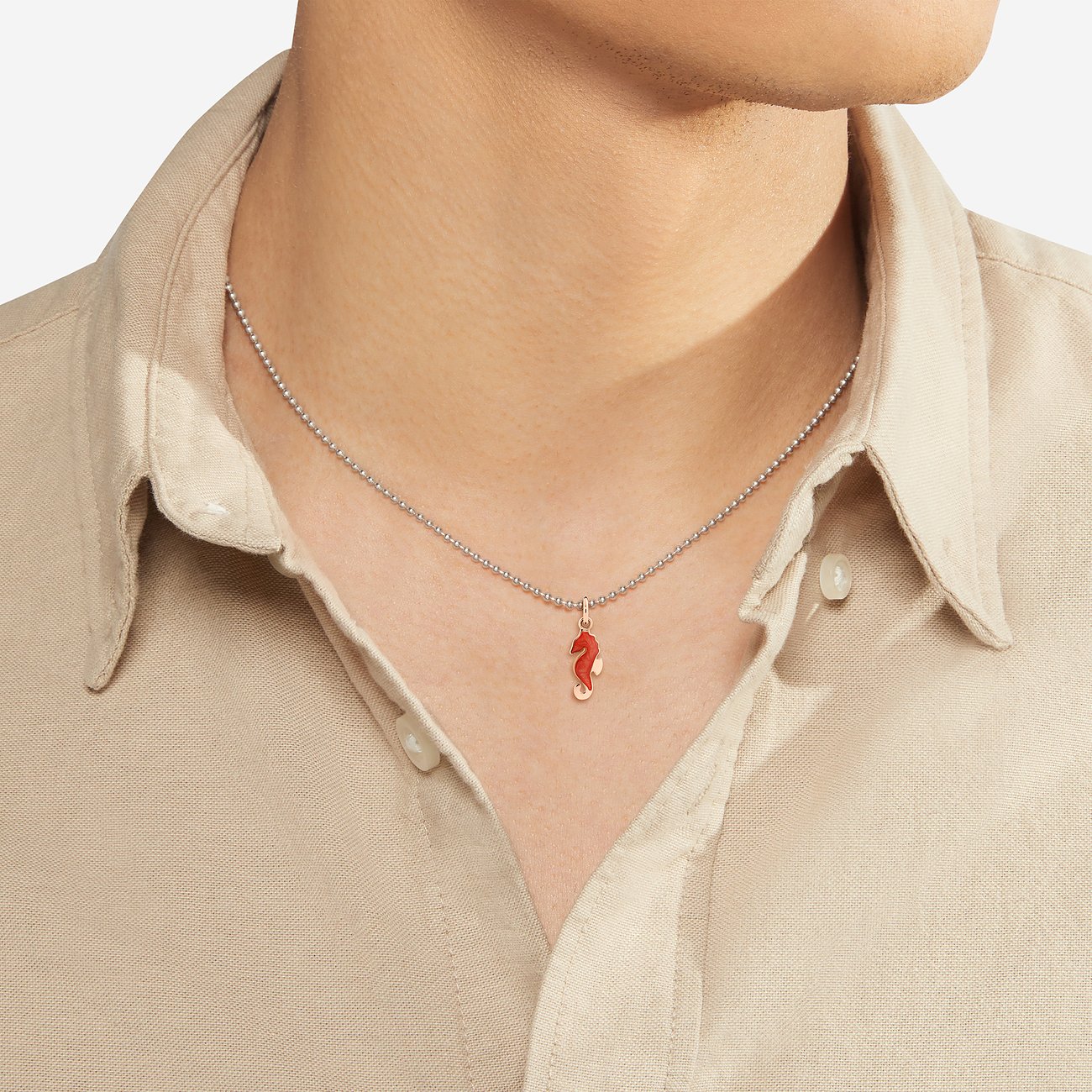 DoDo Anhänger aus 375 Roségold mit roter Emaille.