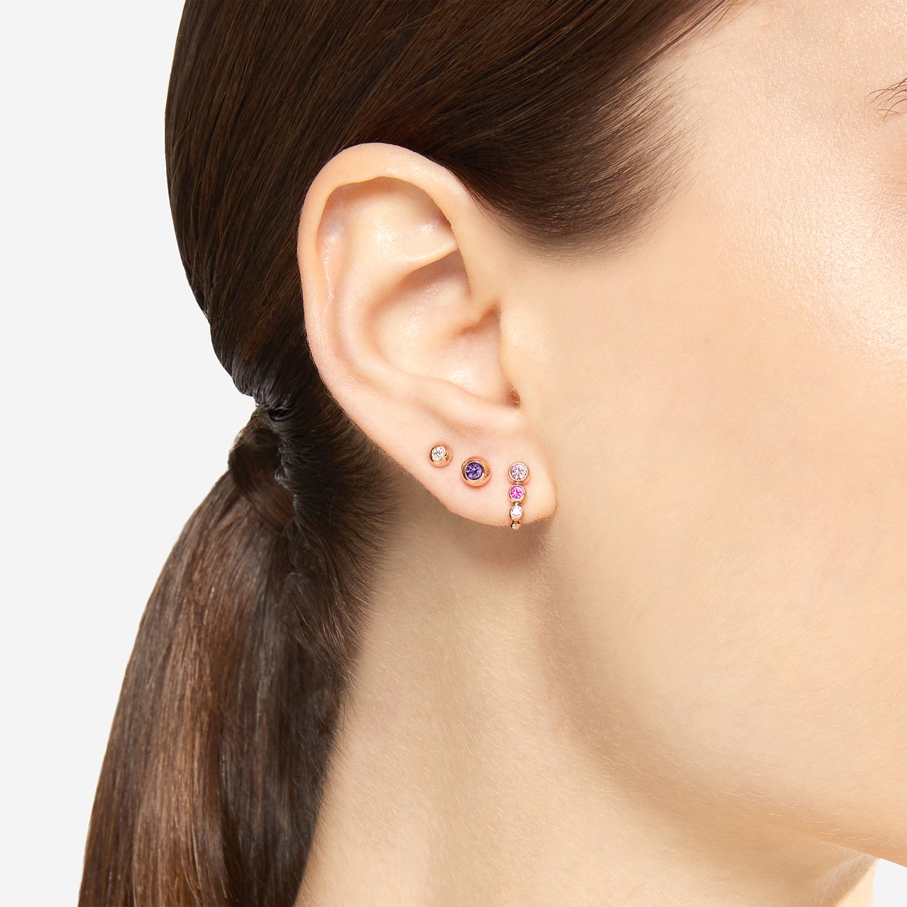 DoDo Ohrstecker aus 375 Roségold mit Amethyst und rosa Steinen.