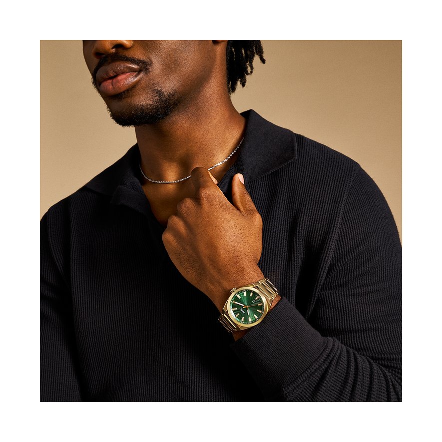 Orologio da uomo Fossil con cassa in acciaio inossidabile, quadrante verde e cassa color oro.