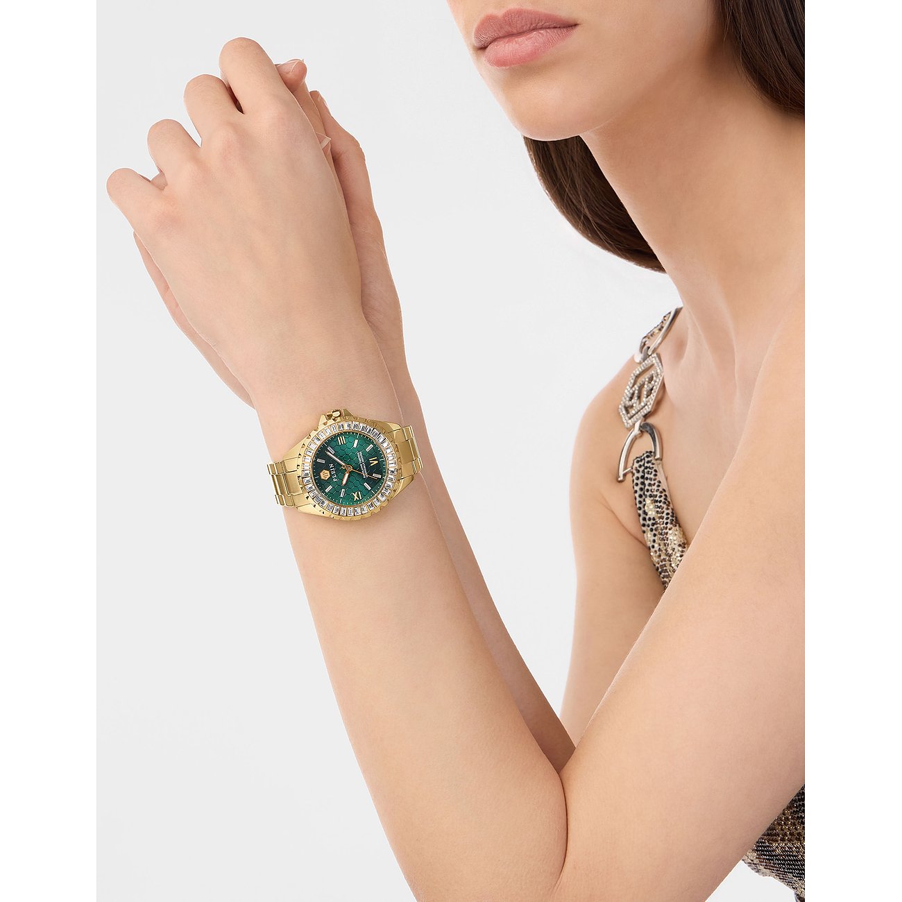 Philipp Plein damklocka i rostfritt stål, guldfärgad, med grön urtavla och kristallinfattad.