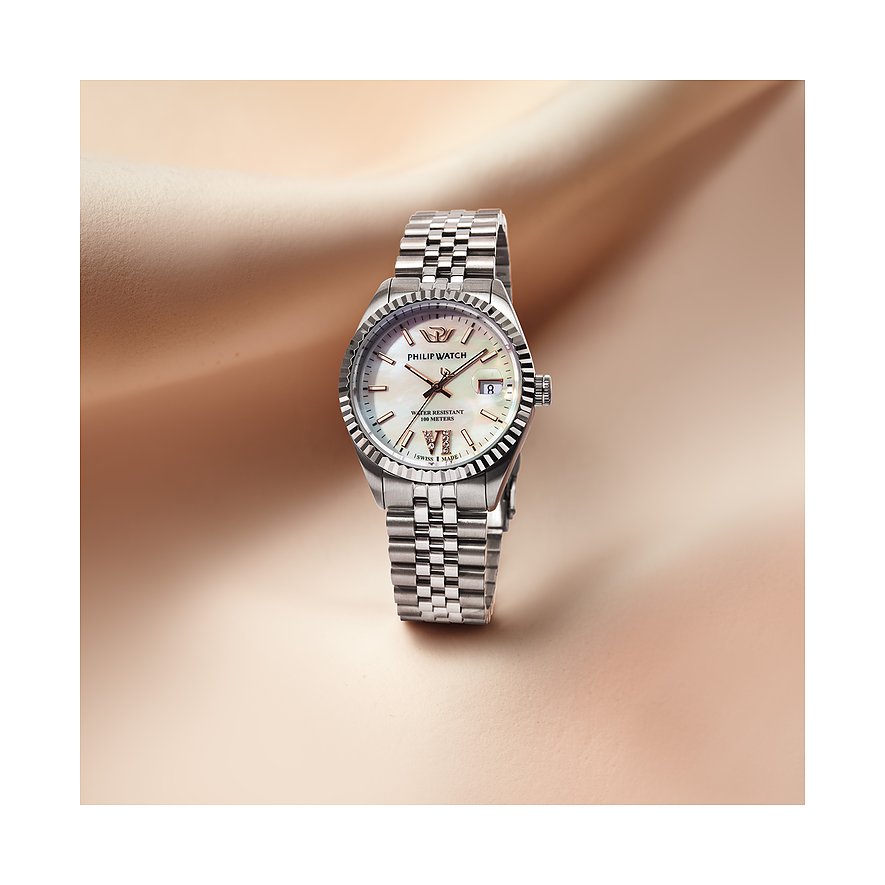 Philip Watch damur i rostfritt stål med räfflat boett och ljus urtavla, vilande på beige satin.