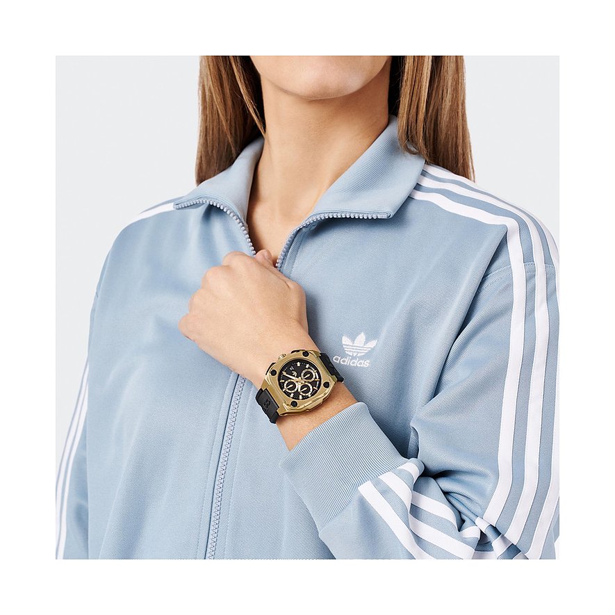 Adidas Herrenuhr mit Edelstahlgehäuse, goldfarben, analog, mit Chronograph.