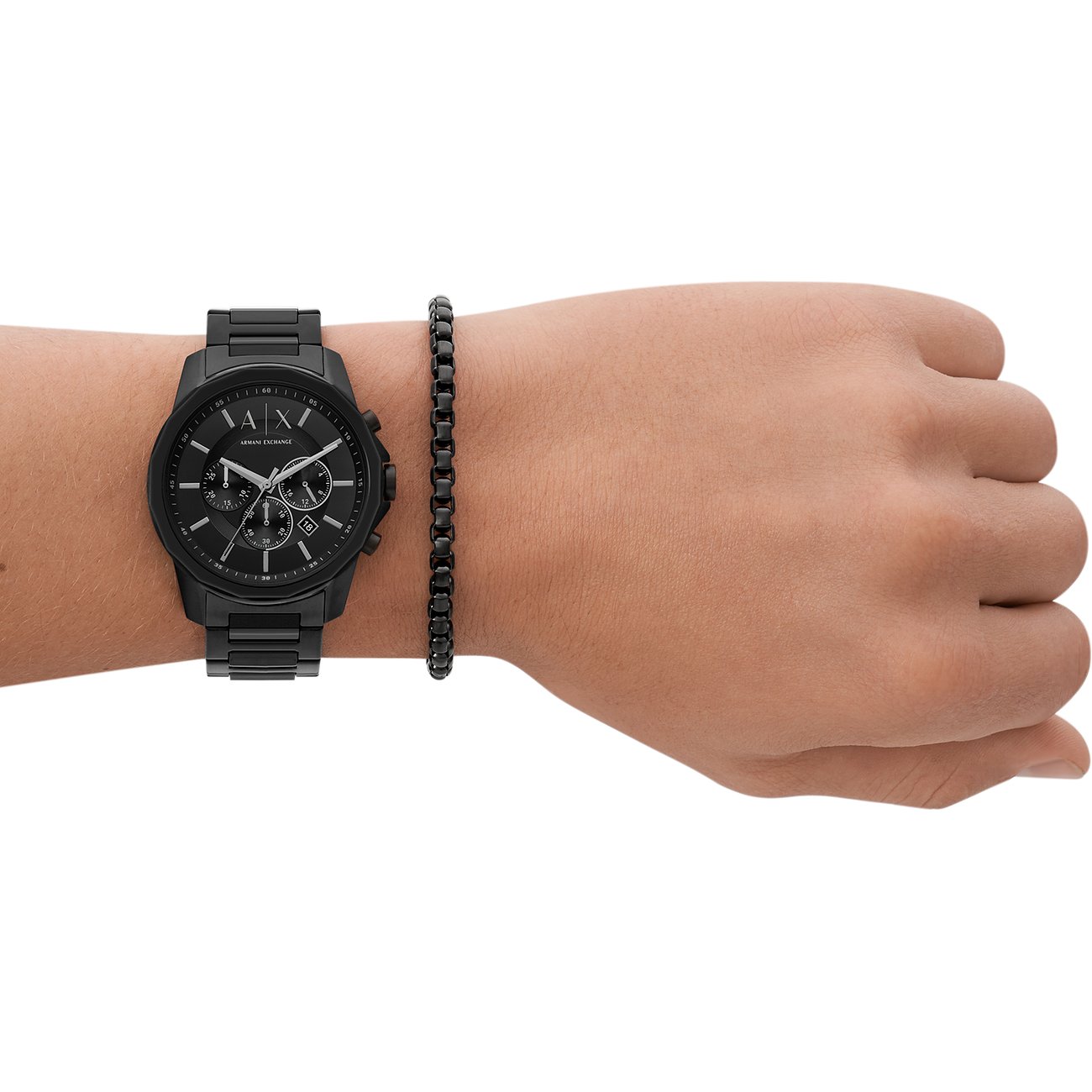 Set Armani Exchange con orologio nero e bracciale nero.