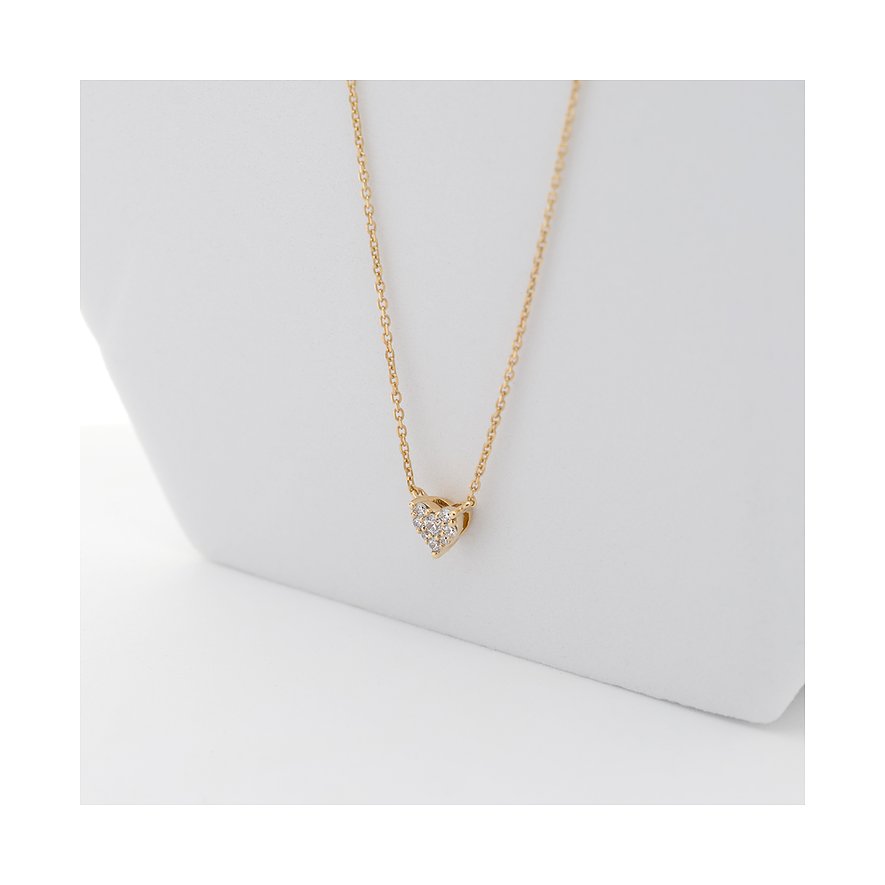 CHRIST Halsschmuck aus 585 Gelbgold mit Diamanten als Herzanhänger.