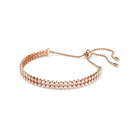 Swarovski Armband aus rosévergoldetem Metall mit weißen Kristallen.