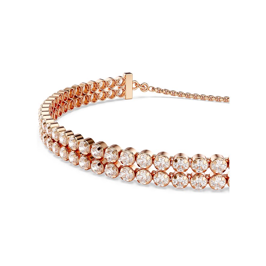 Swarovski Armband aus roségoldfarbenem Metall mit weißen Kristallen.