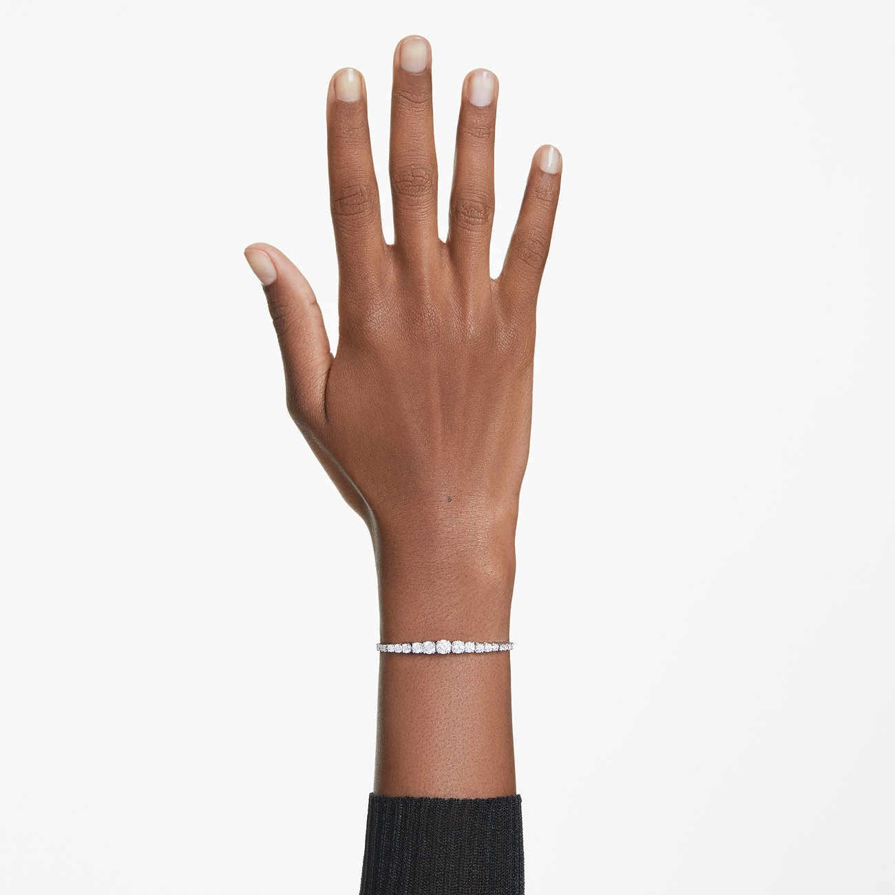 Swarovski Armband aus Metall mit weißen Kristallen.