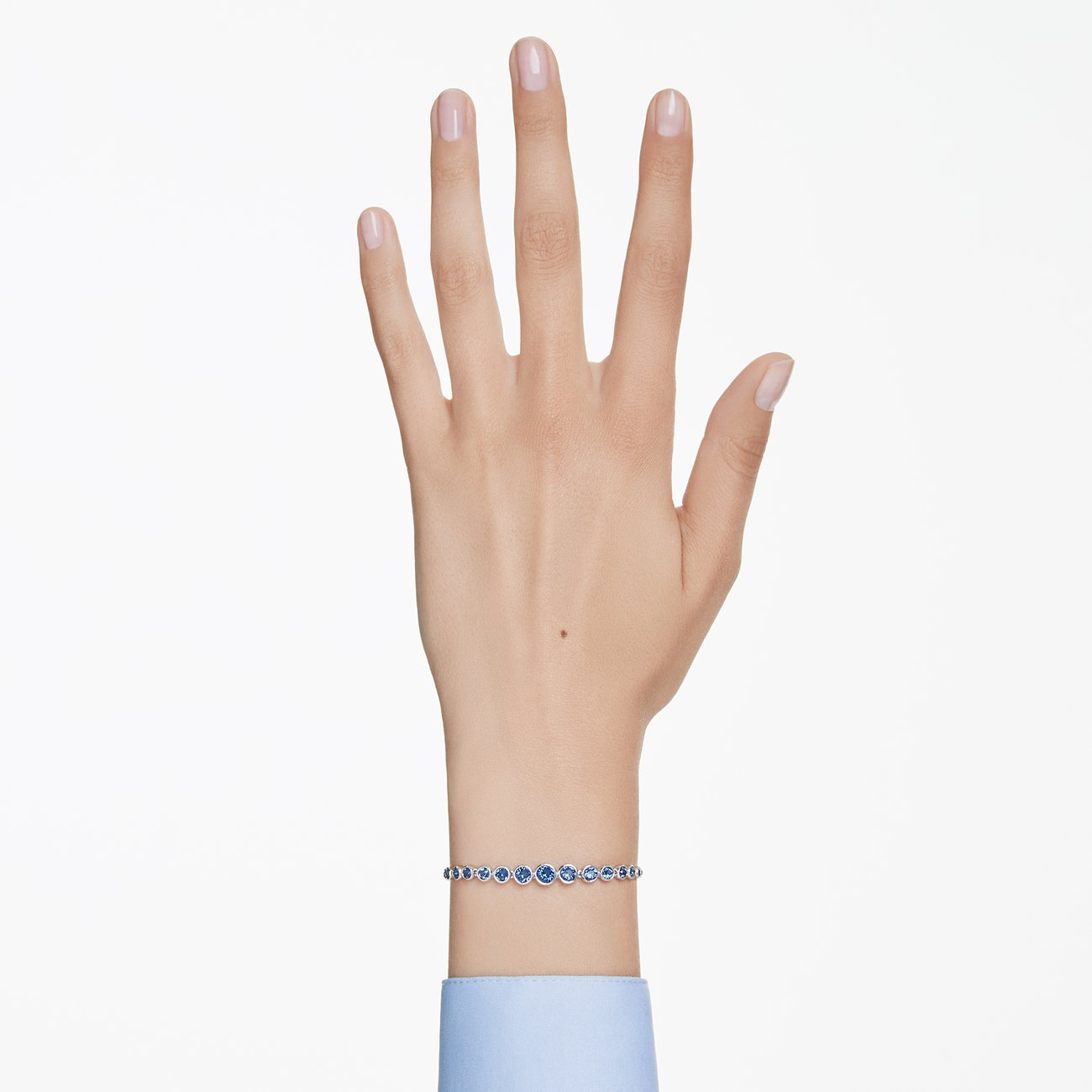 Swarovski Armband aus Metall mit blauen Kristallen.