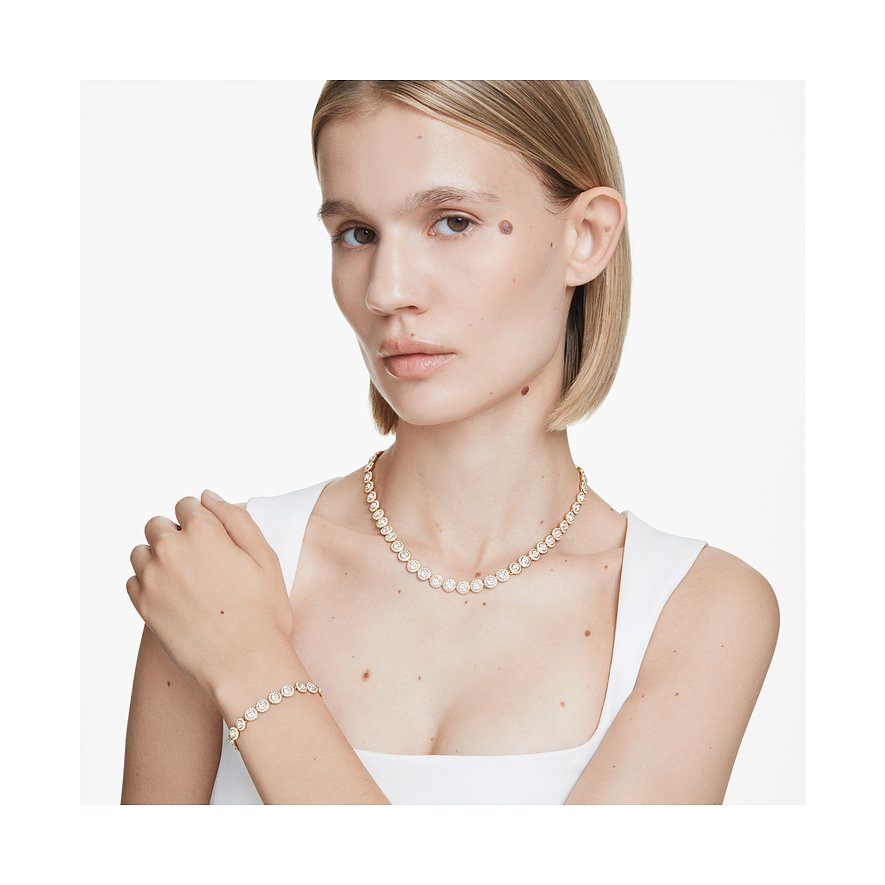 Swarovski Set aus Metall mit Kristallen.