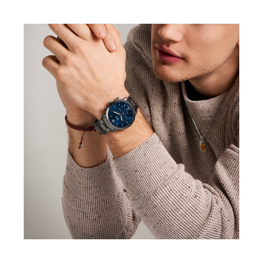 Fossil Herrenuhr mit Edelstahlgehäuse und blauem Zifferblatt, analog.