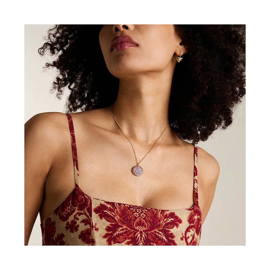 Fossil Halsschmuck aus Edelstahl mit Amethyst und Sternen.