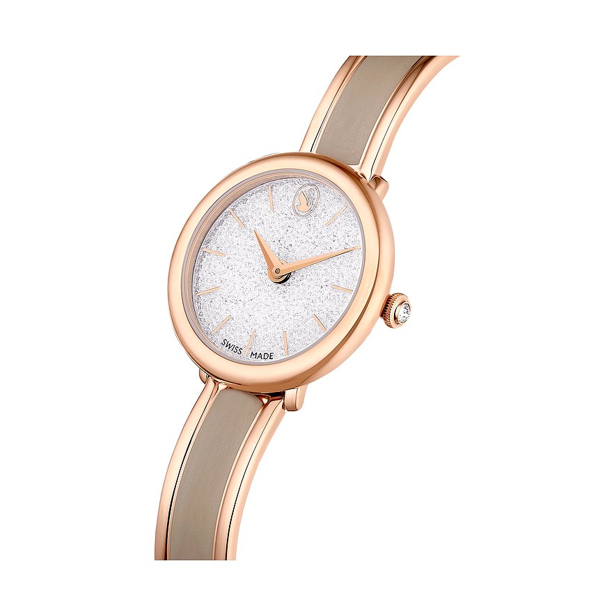 Swarovski Damenuhr mit roségoldfarbenem Gehäuse und weißem Zifferblatt mit Kristallen.