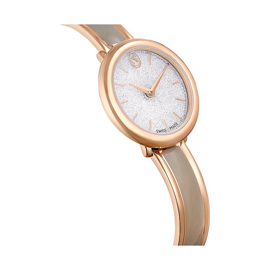 Swarovski Damenuhr mit roségoldfarbenem Gehäuse und Kristallen, analog.
