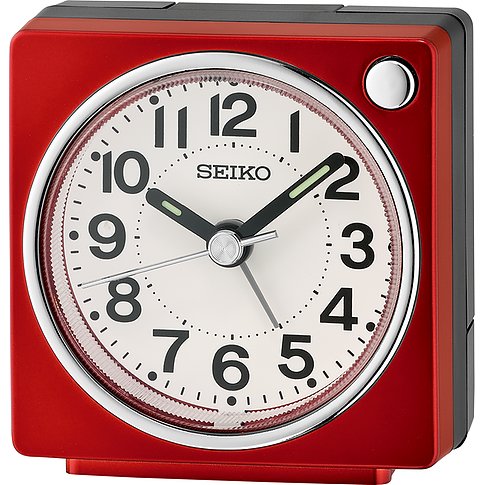 Seiko Wecker mit Kunststoffgehäuse, analoger Anzeige und roten Gehäuse.