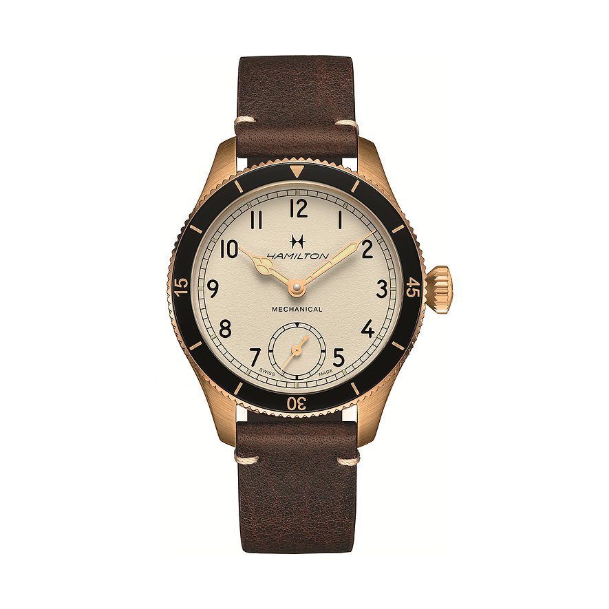 Hamilton Herrenuhr aus Bronze mit braunem Lederarmband, beigem Zifferblatt und schwarzem Rand.