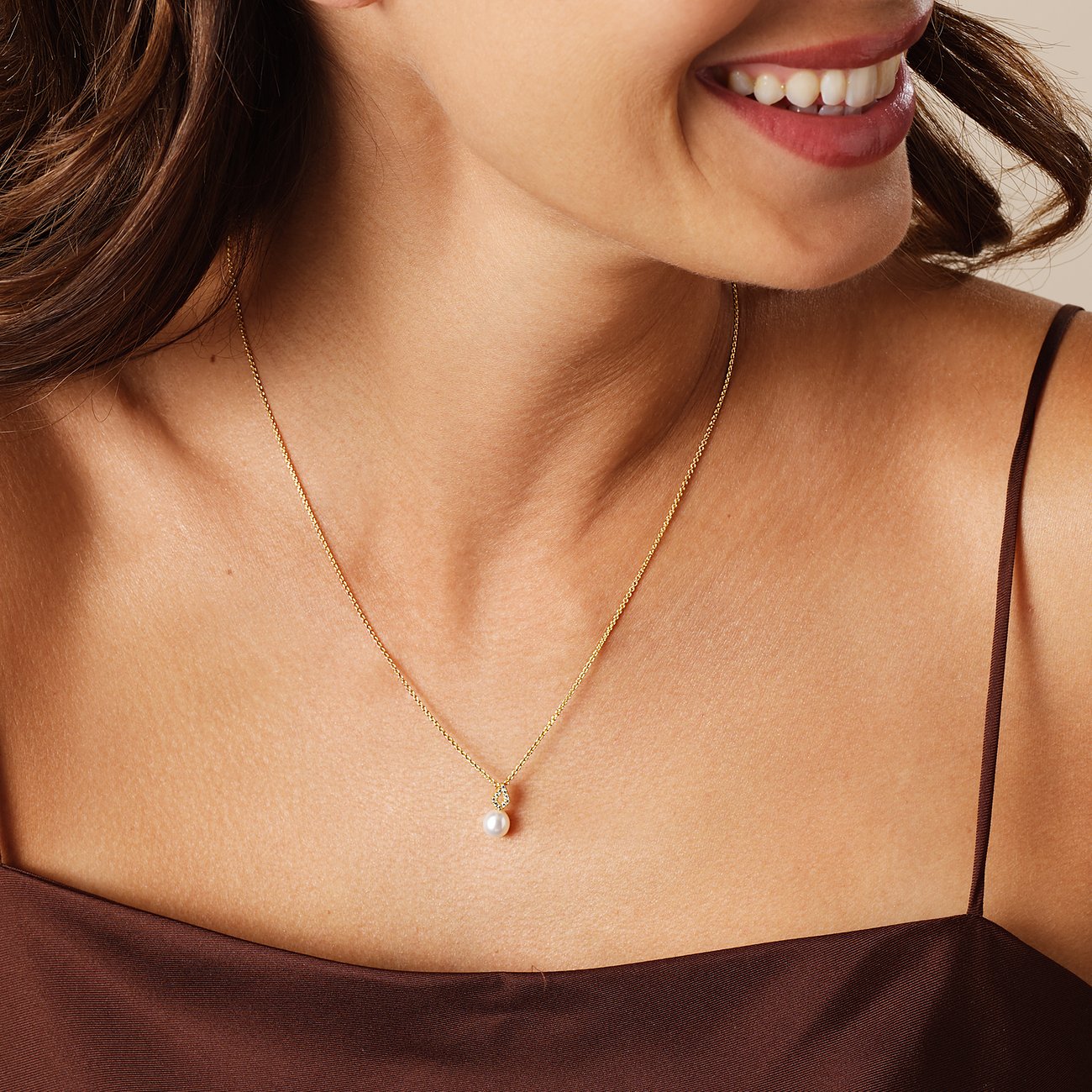 CHRIST ketting van 375 geel goud met parel.